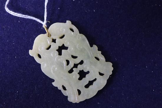 A Chinese carved pendant.